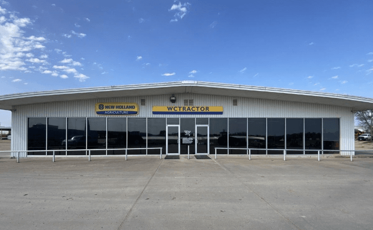 WC Tractor New Holland front of dealership