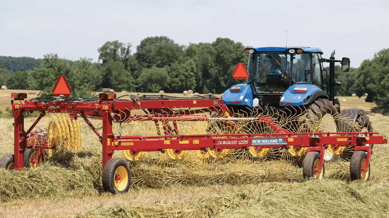 Tractor pulling rake