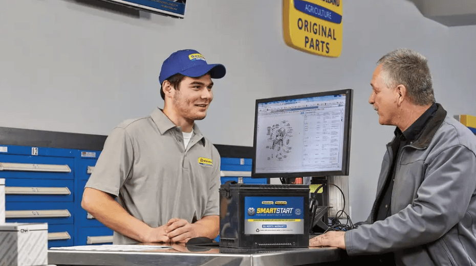 Employee helping a customer