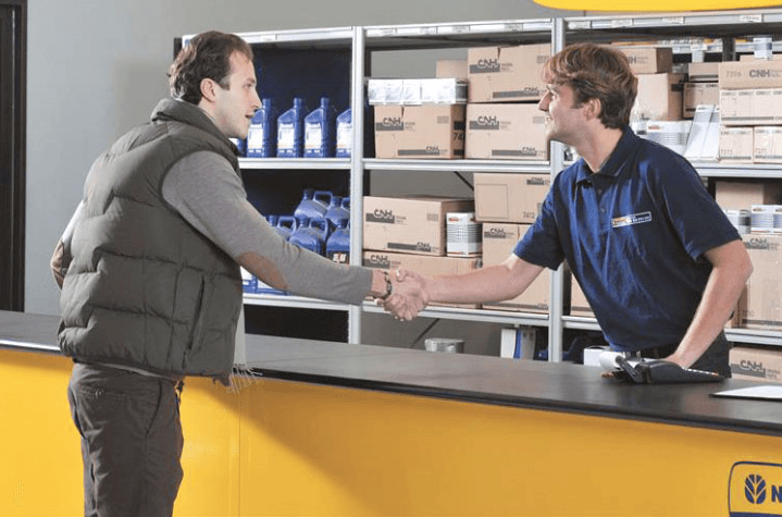 Employee helping a customer