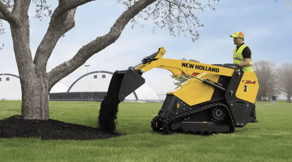 Track Loader dumping soil